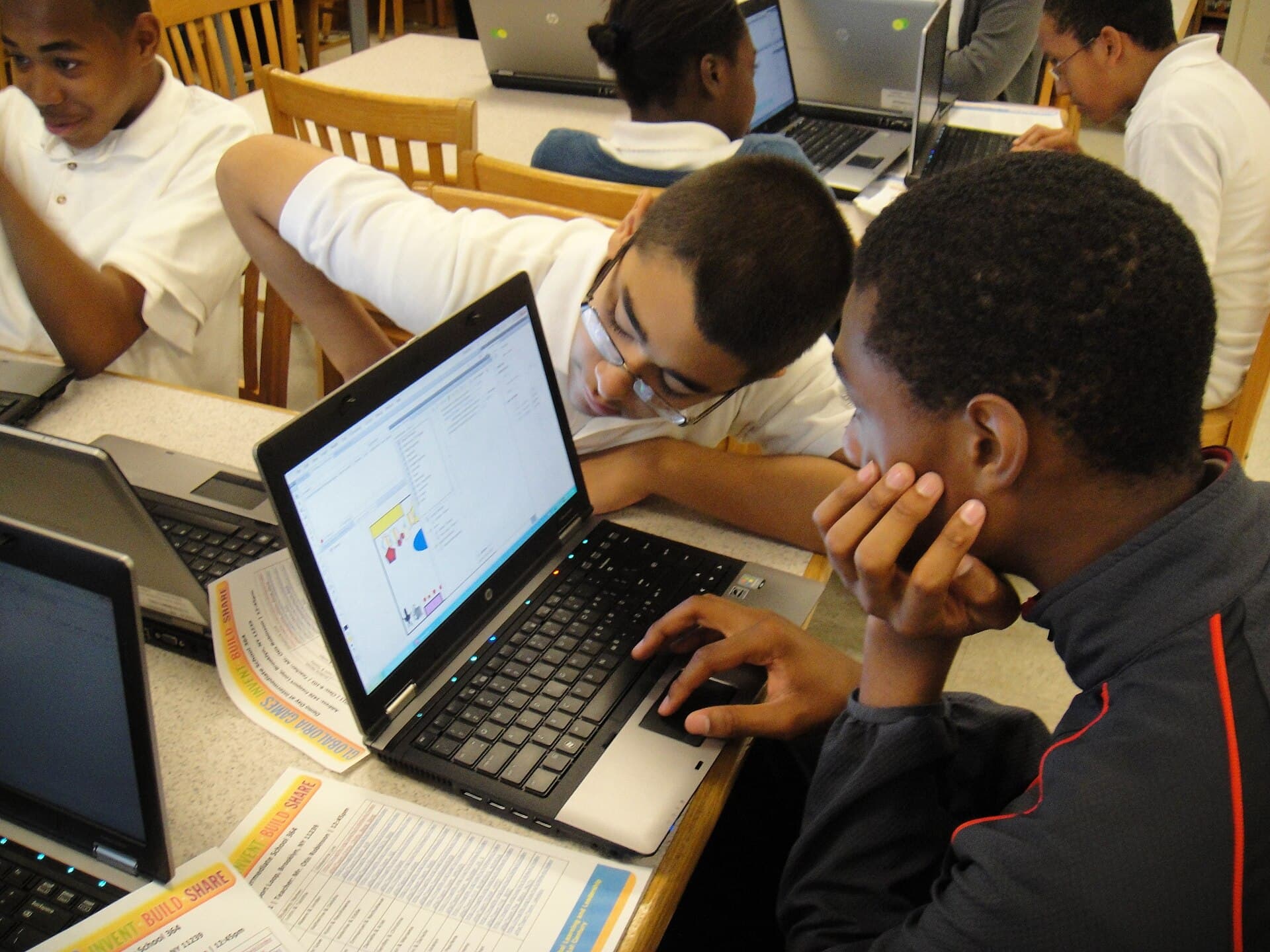 Students working together at computers